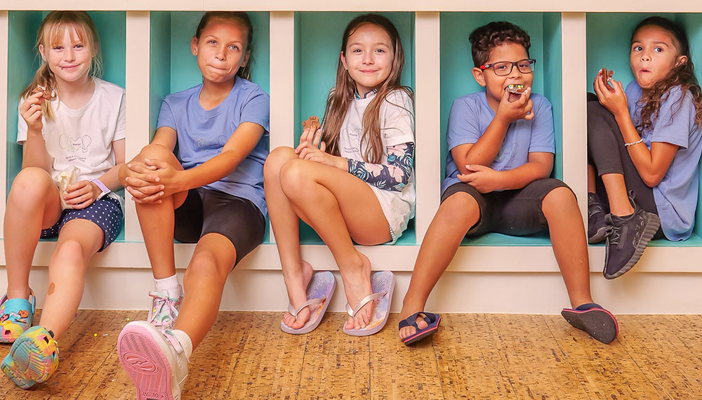 Camp Seafire kids inside cubbies