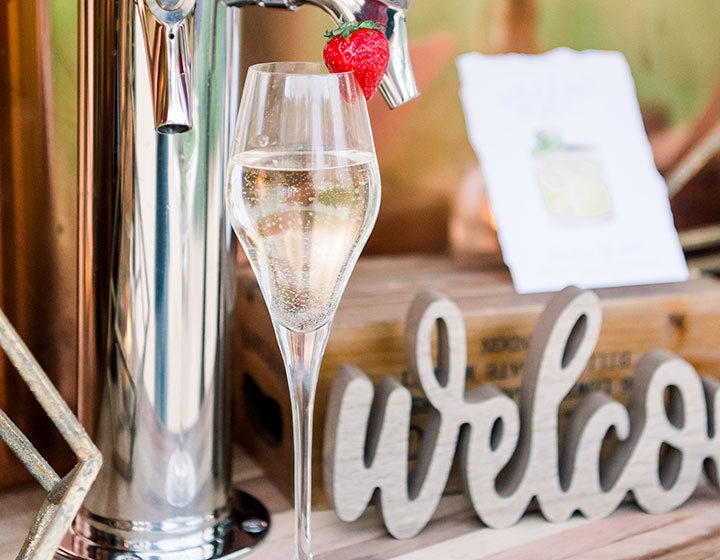 champagne glass with strawberry garnish for wedding at Kimpton Seafire resort and Spa