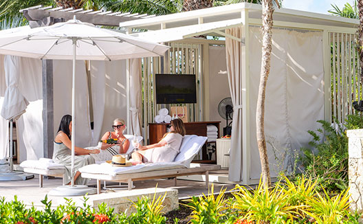 Women in Seabridge Cabana with Champagne